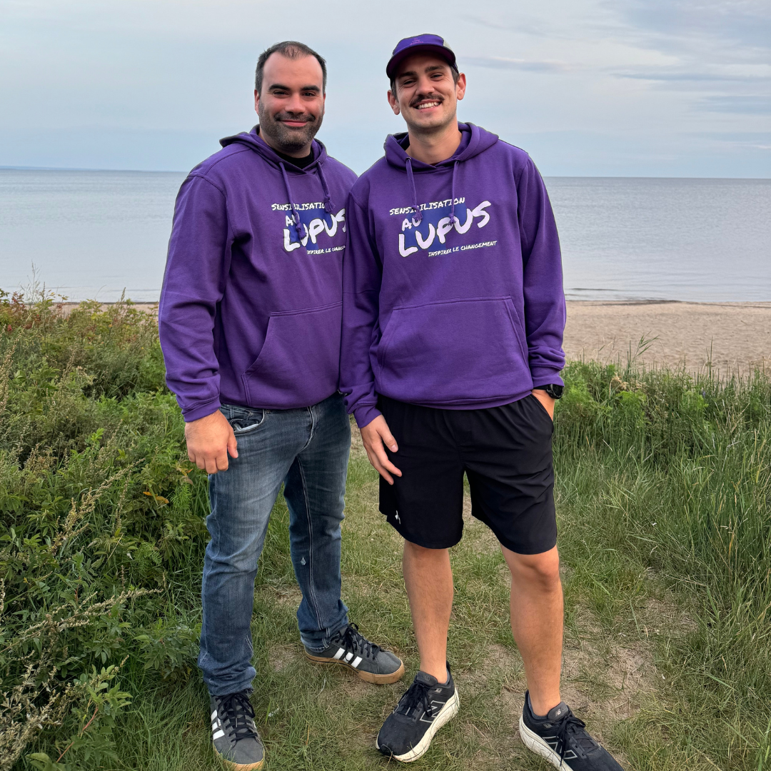 Two men wearing purple hoodies and smiling to raise lupus awareness