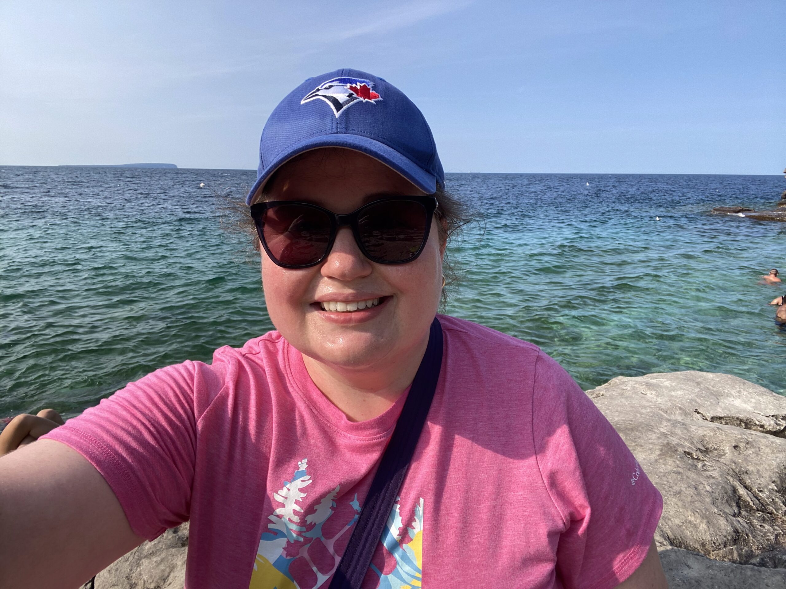 Megan Friedman smiling outdoors in Milton, Ontario, sharing her story of resilience while living with lupus and arthritis.