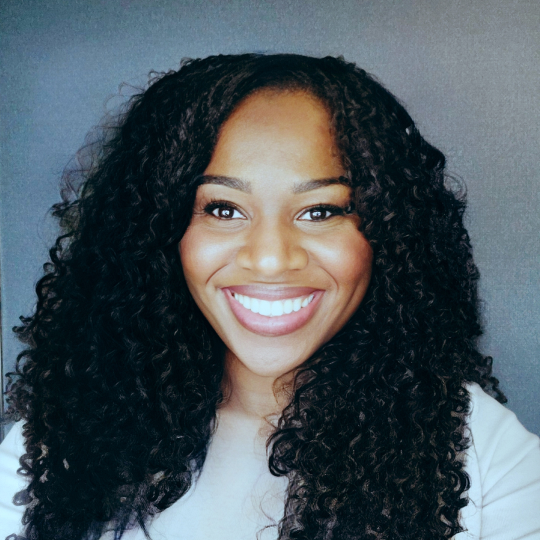 Smiling headshot of Edwina Winston, Lupus Canada Scholarship Winner, with curly hair and light top.