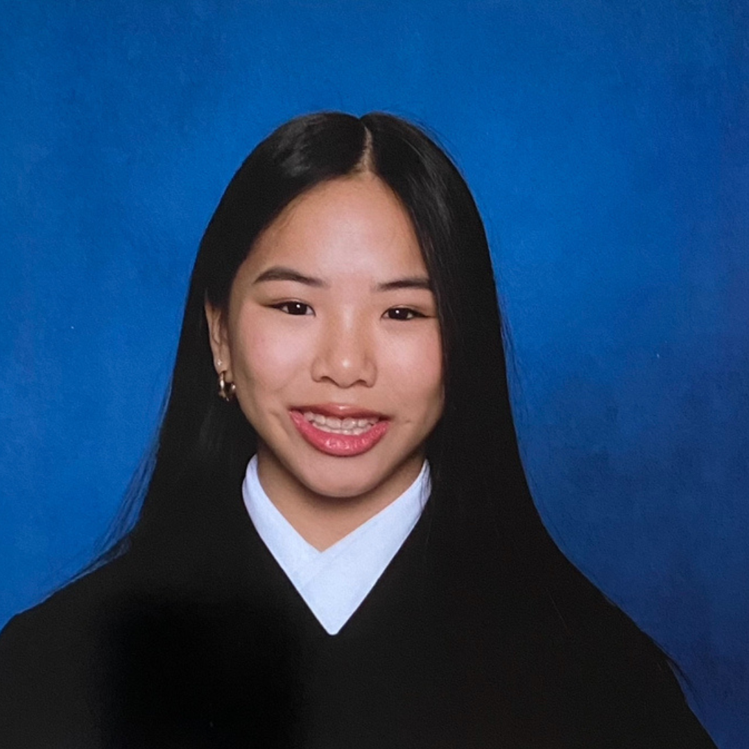 Graduation portrait of Leanne Langlois, Lupus Canada Scholarship Winner, with long dark hair and blue background.