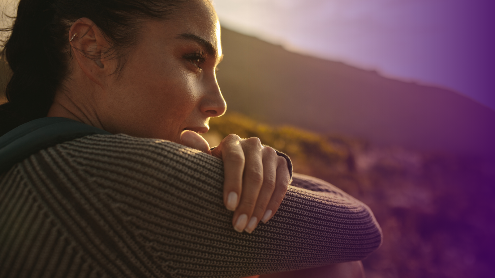 Mental Health and Lupus | Let’s Talk Lupus: A Pathway to Progress Person sitting outdoors with a calm expression, symbolizing reflection; she is thinking about mental health and lupus care.