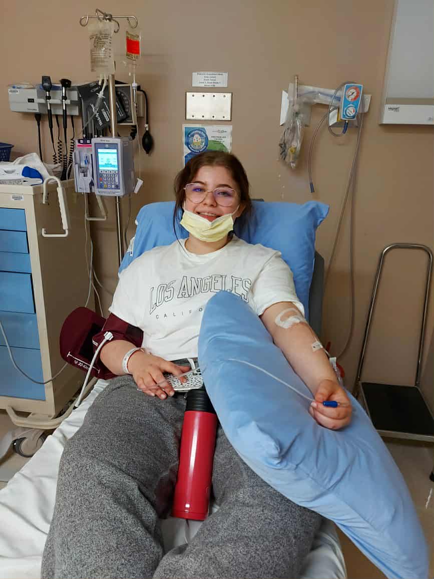 Daniela receiving Rituximab treatment after being diagnosed with lupus