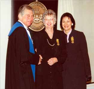 Betty (centre) receiving award